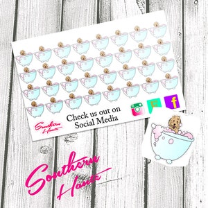 May include: A sheet of 40 white stickers featuring a cartoon dog in a bathtub with bubbles. The dog is light brown with a pink nose and black eyes. The bathtub is light blue with pink bubbles. The stickers are arranged in a grid pattern. The text "Check us out on Social Media" is printed below the stickers. The text "Southern Haute" is printed in pink below the text.
