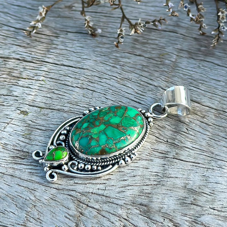 925 Sterling Silver pendant featuring a Handmade Green Copper Turquoise design. Oval shape with two turquoise stones, ideal for celebrating a wedding anniversary with a special gift for her.