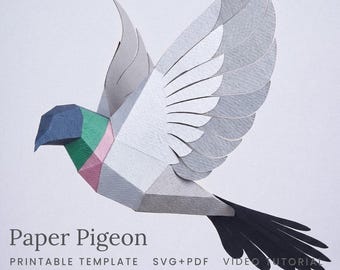 Peut inclure: Un pigeon en papier géométrique avec une tête bleue, un cou vert et rose, un corps blanc, des ailes grises et une queue noire. Le texte indique : smagapaperwood, Paper Pigeon, PRINTABLE TEMPLATE, SVG+PDF, VIDEO TUTORIAL.