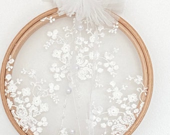 white lace wedding ring holder on tulle - wooden embroidery drum, beads and ribbons