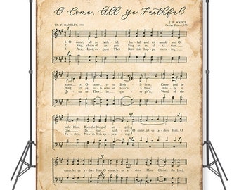 May include: A vintage sheet music backdrop featuring the lyrics and musical notation for the Christmas carol "O Come, All Ye Faithful". The sheet music is printed on aged paper with a brown, yellowed hue. The title is printed in black ink at the top of the page.