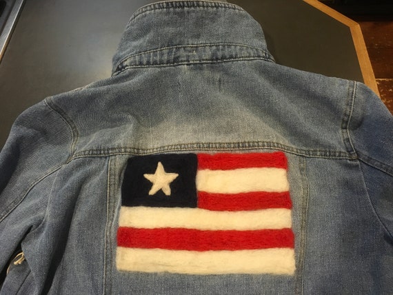 jean jacket with american flag on the back