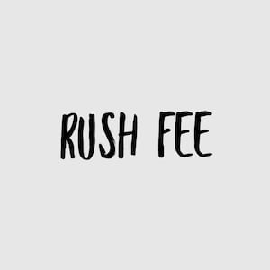 May include: Black and white text that reads "Rush Fee" in a handwritten style.