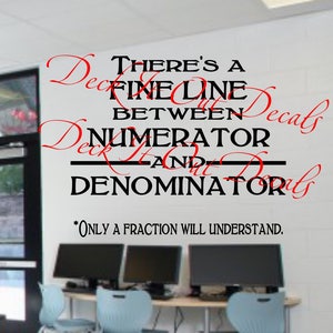 May include: A black and white wall decal with the text "There's a fine line between numerator and denominator. *Only a fraction will understand."