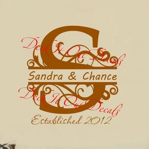 May include: A brown vinyl wall decal with a decorative initial "S" and the text "Sandra & Chance Established 2012".