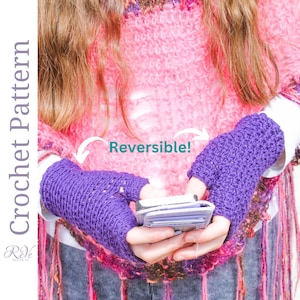 May include: A pair of purple crochet fingerless gloves. The gloves are held by a person. The image also includes the text "Crochet Pattern" and "Reversible!"