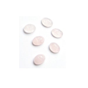 May include: Six oval-shaped, light pink rose quartz stones with carved designs.