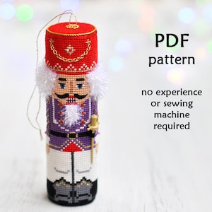 Modèles de point de croix de Noël. Ornements de Noël au point de croix. Modèle de point de croix Casse-Noisette. Point de croix 3D. Point de croix compté.