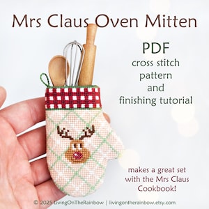 May include: A cross-stitched oven mitt with a reindeer design, holding miniature wooden kitchen tools. The mitt features a red and white checkered cuff and a green diamond pattern. Text on the image reads "Mrs Claus Oven Mitten" and "PDF cross stitch pattern and finishing tutorial."