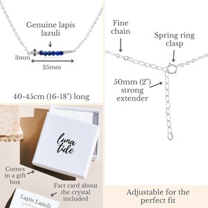 May include: A silver necklace with a lapis lazuli stone bar pendant. The necklace is 16 to 18 inches long and has a 2 inch extender. The necklace comes in a white gift box with a Luna Tide logo. A fact card about the crystal is included.