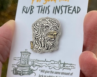 Greyfriars Bobby enamel pin badge complete with gold coloured nose which if rubbed may bring good luck! A souvenir from Edinburgh, Scotland.