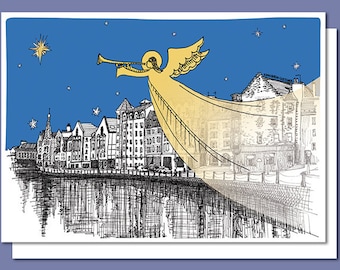 May include: A gold angel with wings spread wide plays a trumpet over a black and white illustration of a city skyline with a river and stars in the blue sky.