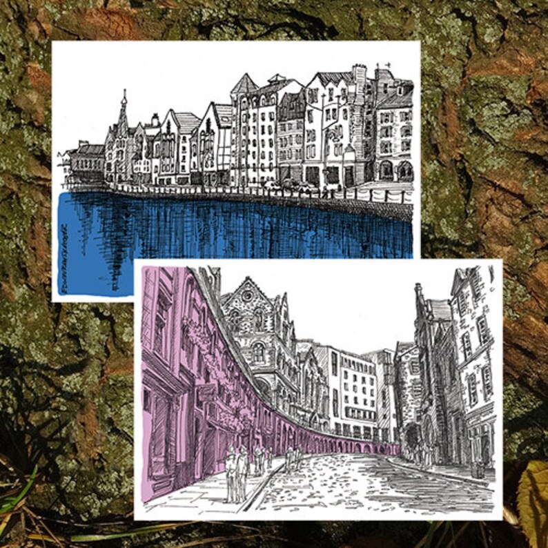 Puede incluir: Dos dibujos a tinta negra y blanca de paisajes urbanos. El dibujo superior muestra una escena de paseo mar&iacute;timo con edificios a lo largo del agua. El dibujo inferior muestra una escena de calle con edificios a ambos lados de la calle.