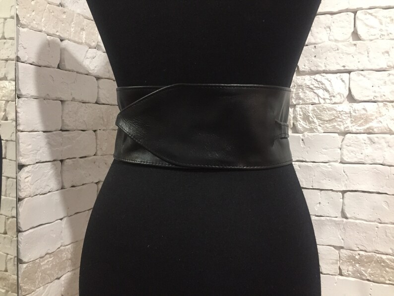 Black leather obi belts.