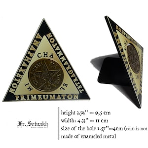 May include: A triangular, black and gold metal display stand with the words "ANAPHAXΕΤΟΝ TOY CHA TETRAGRAMMATON IW EL PRIMEUMATON" inscribed around the perimeter. The stand is 3.74 inches tall and 4.33 inches wide. The stand has a 1.57 inch diameter hole in the center for a coin. The stand is made of enameled metal.