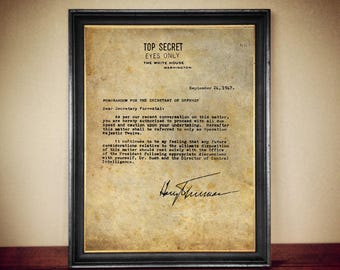 May include: A framed document with a vintage aesthetic, featuring a top secret memo from the White House dated September 24, 1947. The memo is addressed to the Secretary of Defense and discusses Operation Majestic Twelve.