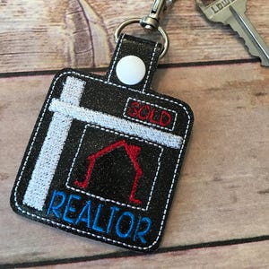 REALTOR KEY FOB. Realtor sold sign snap tab. Realtor key fob. Key chain. Perfect for purses, bookbags, keys, diaper bags, & more!