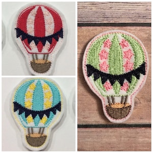 VARMLUFTSBALLONG-filtkryss! Varmluftsballonger. Filtkryss till hårrosetter. Scrapbooking. Namnspännen. Planeringsklämmor. Pysseldekorationer och mer!