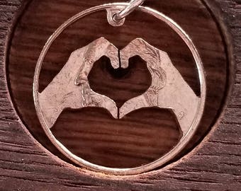 Heart pendant; heart necklace; hands pendant; hands necklace; Hands forming heart design hand cut coin pendant