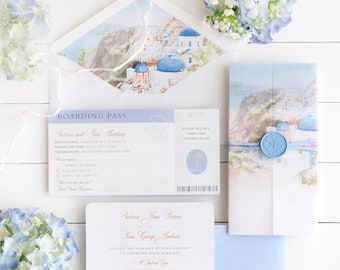 May include: A wedding invitation suite with a passport theme. The invitation features a watercolor illustration of Santorini, Greece, and the text "Victoria Jane Brown and Kean George Jackson". The RSVP card is a boarding pass with the text "Boarding Pass" and "Destination: Santorini, Greece".
