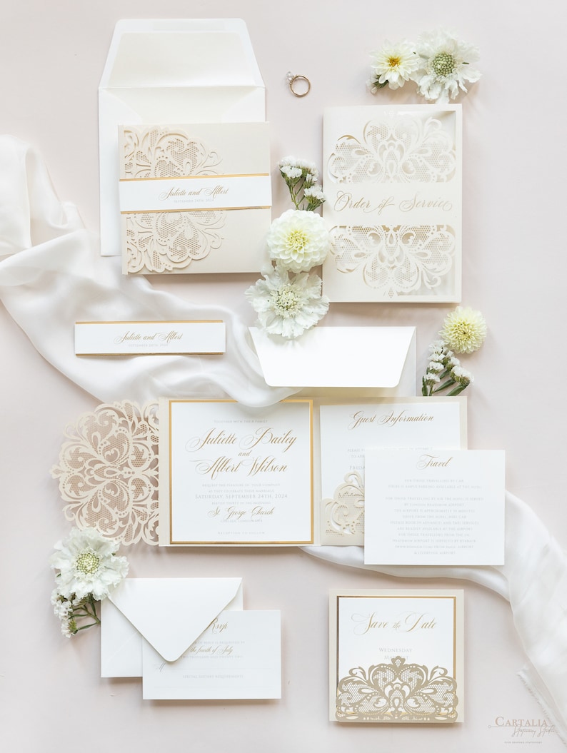 May include: Wedding invitation suite with laser cut ivory cardstock featuring a floral design with gold accents. The invitation includes the names Juliette Daily and Allert Wilson, the date September 17th, 2023, and the location St. George Church.
