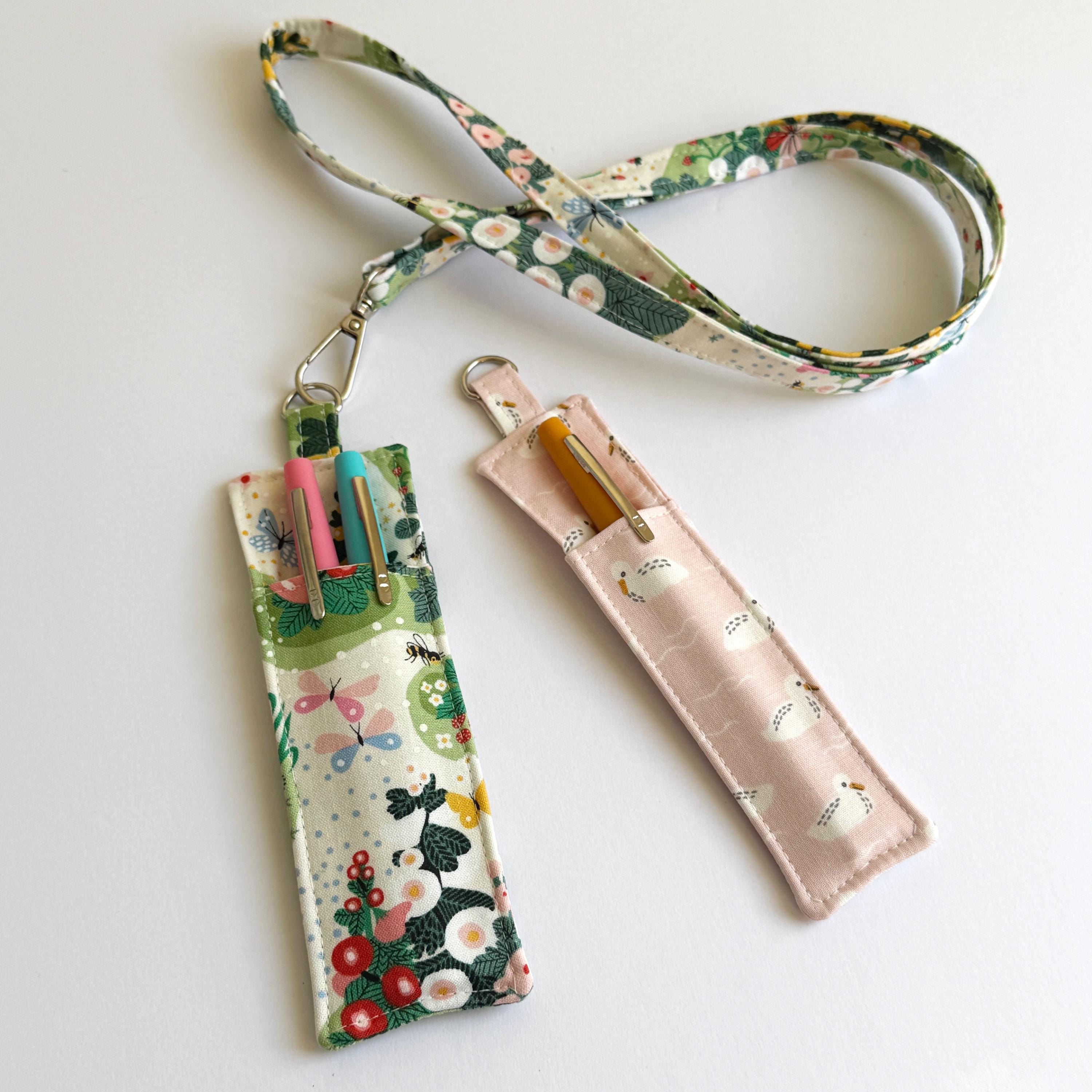 completed lanyard pen holder designs side by side: double-sided, beginner, scrap-buster
