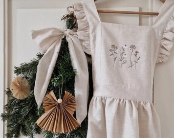 Hand made embroidered linnen apron with frills.