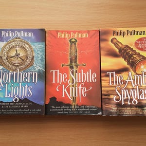 His Dark Materials: 'Northern Lights' 'The Subtle Knife' The Amber Spyglass': The Award-Winning Trilogy in One Volume: 9781407105550 His Dark Materials: 'Northern Lights' 'The Subtle Knife' The Amber Spyglass': The Award-Winning Trilogy in One Volume: 9781407105550