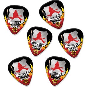 May include: Six black and red guitar picks with a silver shield design. Each pick features a silhouette of a person playing a guitar and the text "Uncles Rock!" in white letters with a red star.