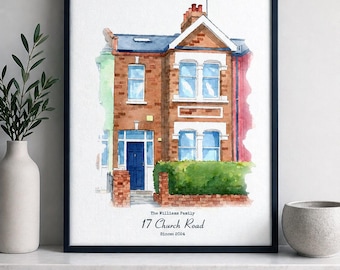 May include: Watercolor painting of a two-story brick house with a blue door and windows. The house has a green hedge and the text "The Williams Family 17 Church Road Since 2024" in a black frame.