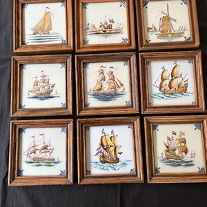 Collection of 9 Dutch MAKKUM delft Framed Tiles mostly ships