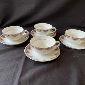 set of 4 art nouveau german porcelain cups and saucers. Marked bottom