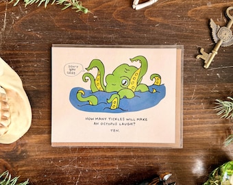 Tarjeta de felicitación ilustrada en blanco con juego de palabras del pulpo "Diez cosquillas"