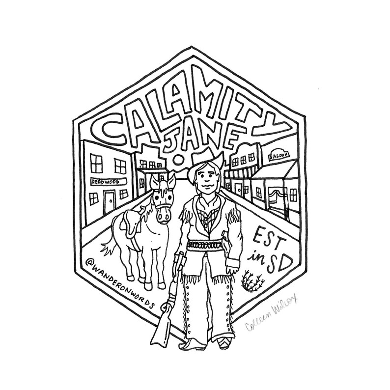 May include: Black and white line drawing illustration of Calamity Jane, a female cowboy, standing with a horse in front of a western town. The text "Calamity Jane" is written in a stylized font above her head. The text "EST in SD" is written below her. The text "@Wanderonwords" is written below the horse. The text "Colleen Wilcoy" is written in the bottom right corner.