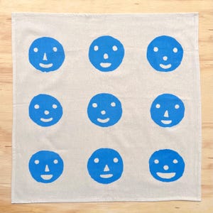 Tea towel hand printed big smiley blue