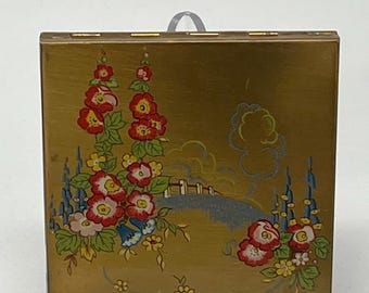 Polvera pintada a mano de Zenette, década de 1920.