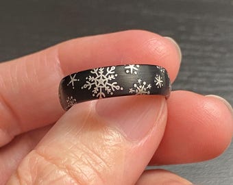 Snow Ring: White Snowflakes Pattern on a Black Tungsten Comfort Fit Band, Add Optional Personalized Engraving Inside