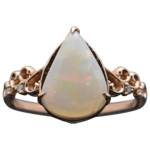 14 Karat Rose Gold Ethiopian Opal and Diamonds Ring