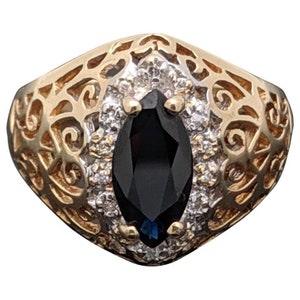 Vintage 14 Karat Yellow Gold Sapphire and Diamonds Ring