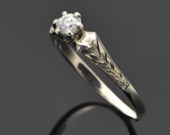 14kt white gold engraved band diamond solitaire