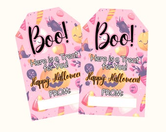 May include: Two printable Halloween favor tags with a pink background and a cute cartoon design. The tags feature a pumpkin, candy corn, and a witch's hat. The text on the tags reads "Boo! Here is a Treat for You! Happy Halloween! From:"