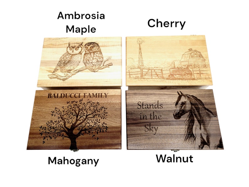 four wooden boxes with different designs on them
