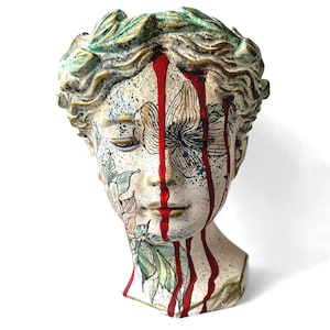 Maceta de yeso pintada a mano