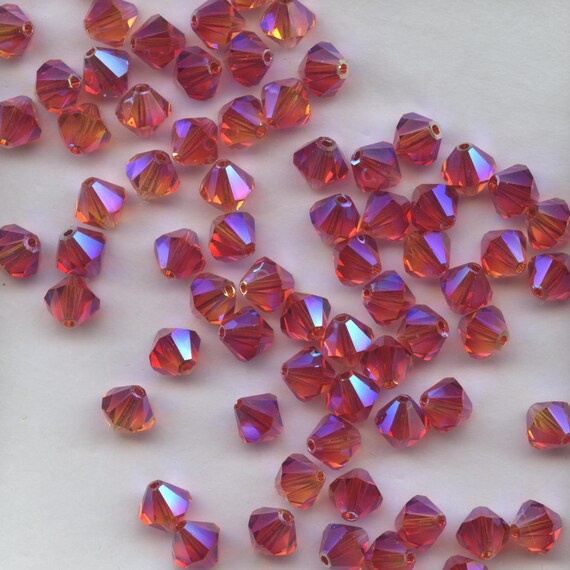 7 Perles Toupies 4mm cristal Swarovski LIGHT SIAM
