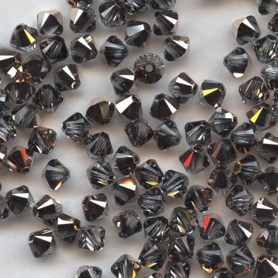 15 Perles Toupies 6mm Cristal Swarovski EMERALD AB 5328 XILION