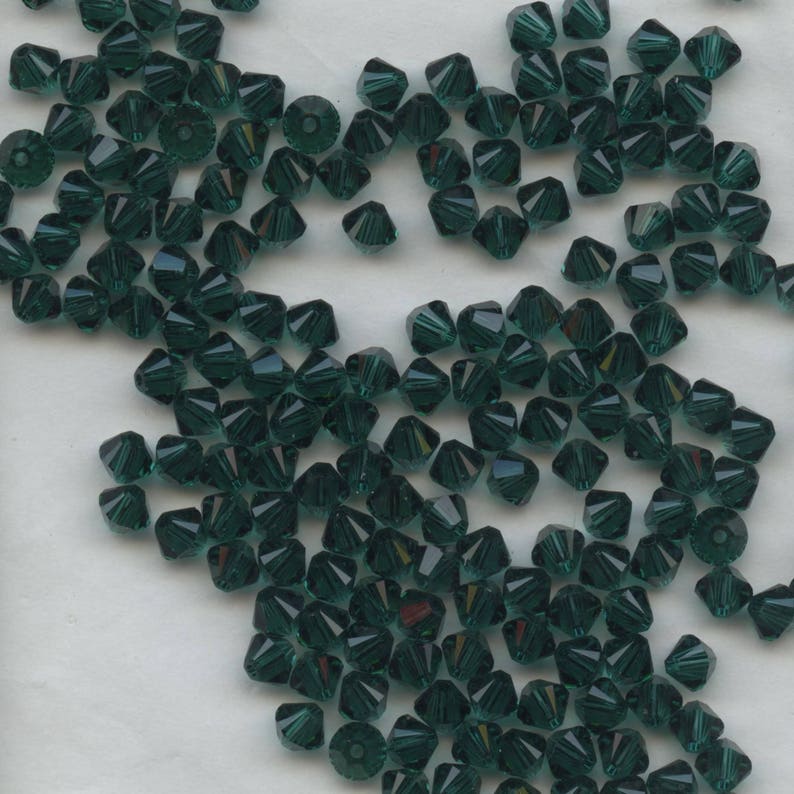 25 toupies 4mm cristal cristal de swarovski.