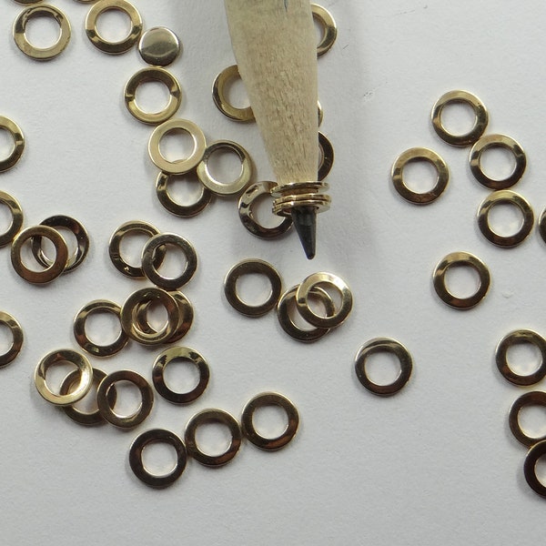 500104 *** 100 anneaux-rondelles en acier doré diam. ext. 5mm, diam. int.3mm