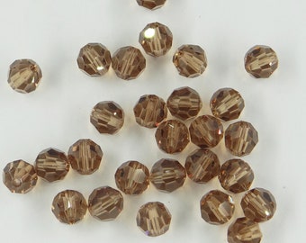 5000 8 LT *** 12 perles rondes cristal Swarovski réf. 5000 8mm light smoked topaz