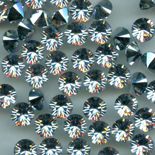 1028 SS34 CC : 12 Swarovski rhinestones point back SS34 (7,2mm) crystal comet argent light