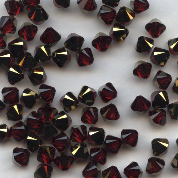 Xilion RUBY AB2X 15 Perles Toupies 4mm Cristal Swarovski